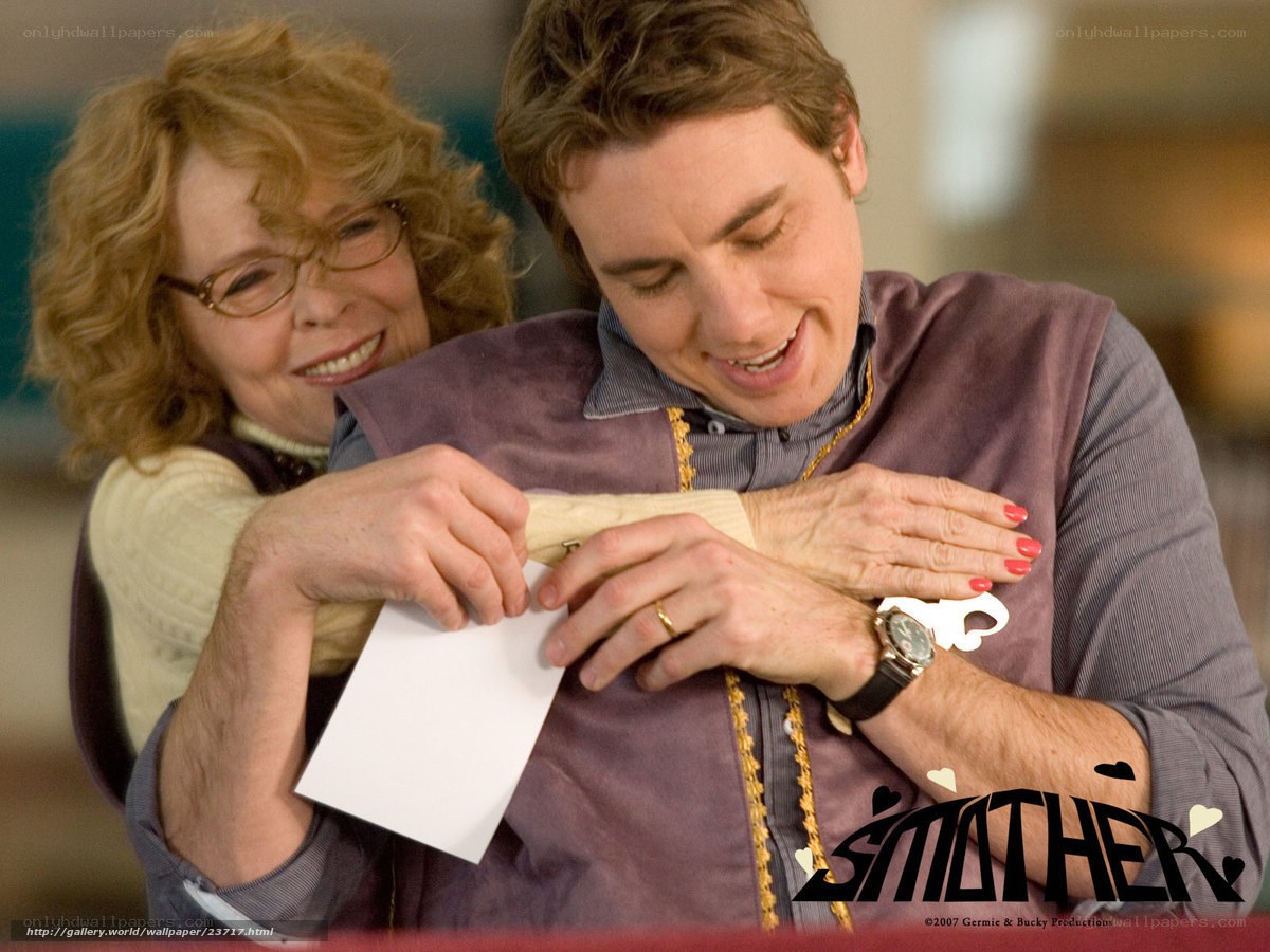 man and woman reading a letter