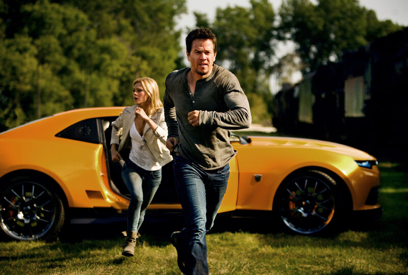 Man and woman running from car