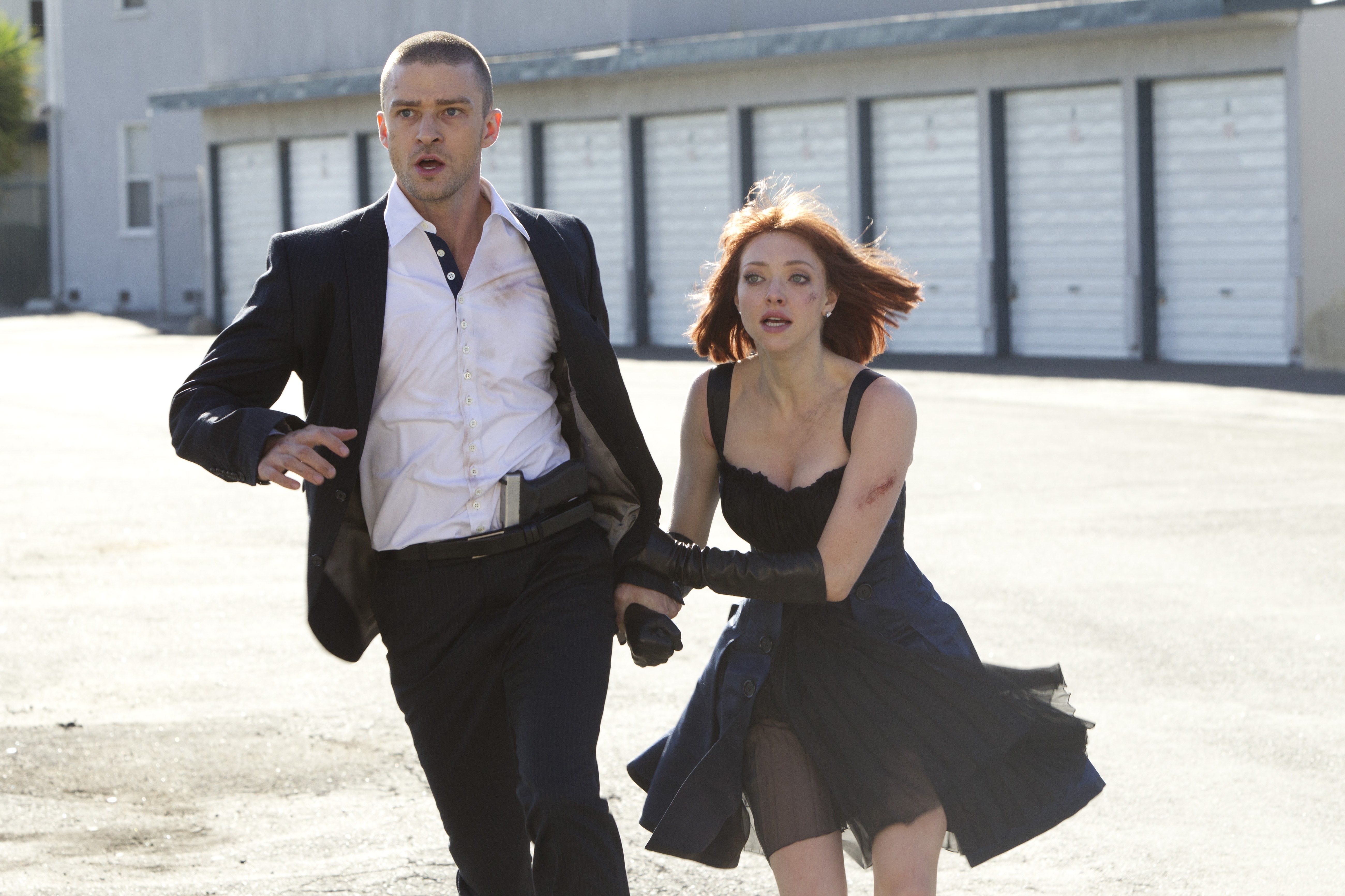 Man and woman running in panic