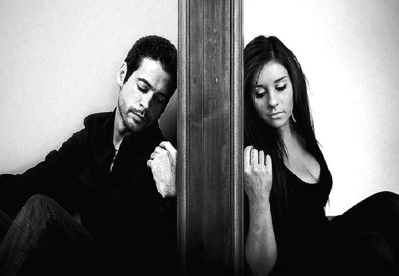Man and Woman Sitting — Black, Somber