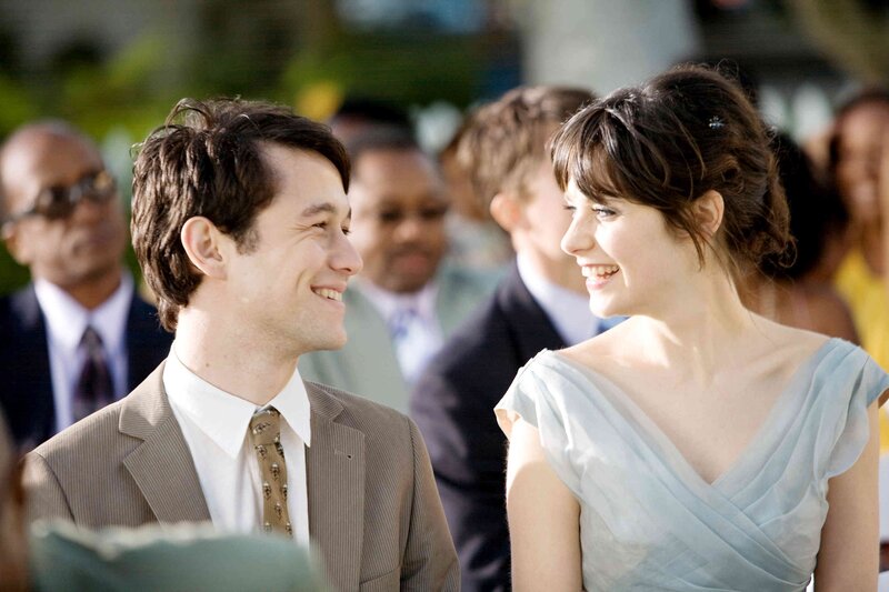 man and woman smiling at each other