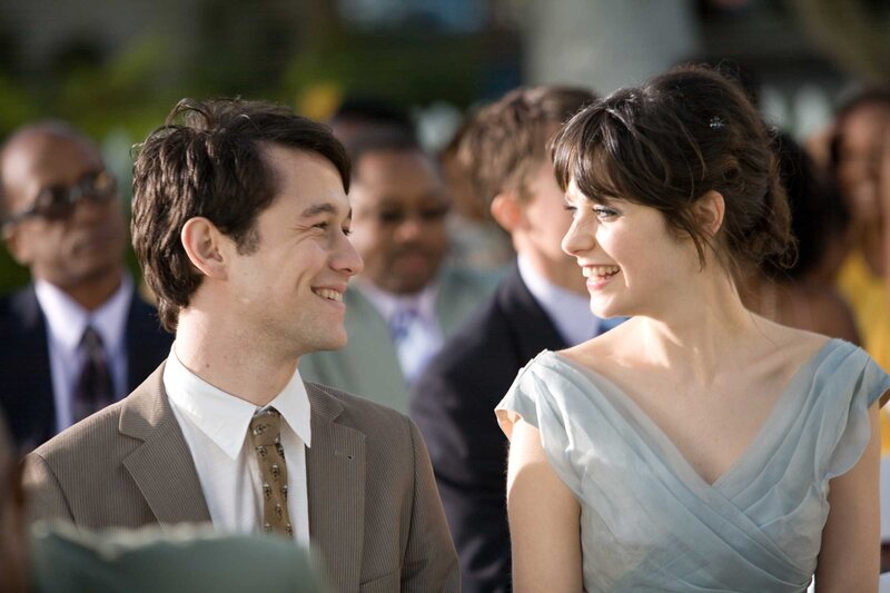 man and woman smiling at each other