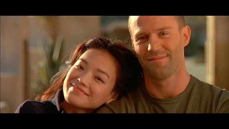 man and woman smiling together