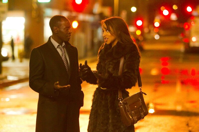 Man and woman talking on street