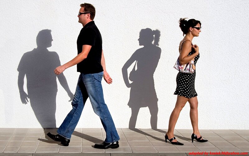 Man and woman walking apart