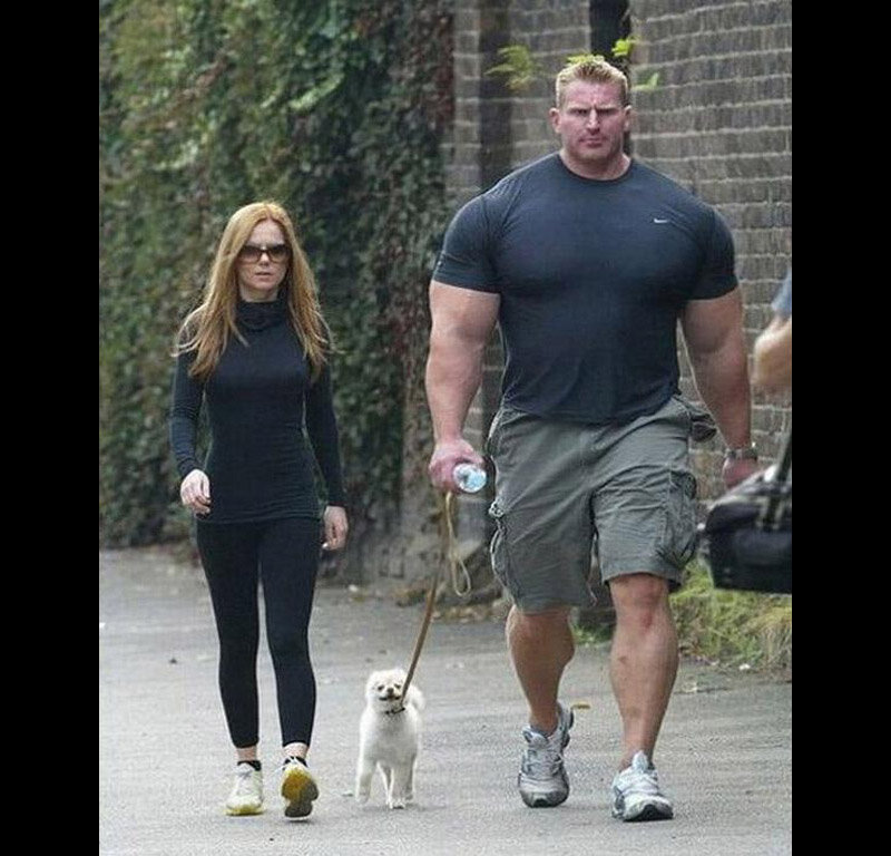 Man and Woman Walking Dog — Black