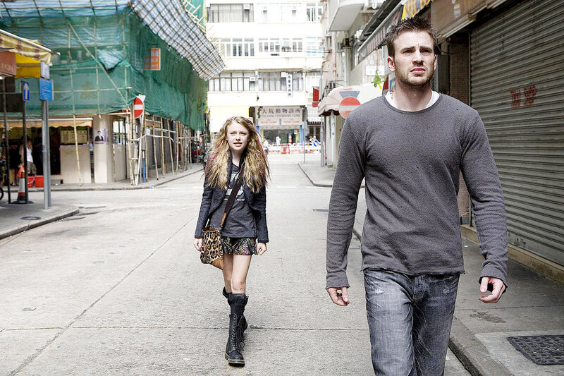 Man and woman walking in city