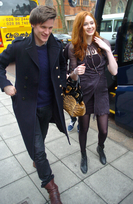Man and woman walking on street