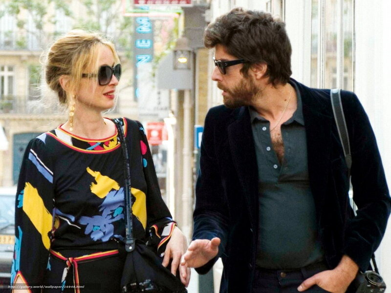Man and woman walking on street