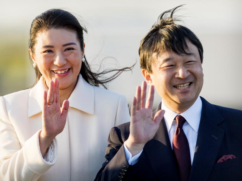 Man and Woman Waving