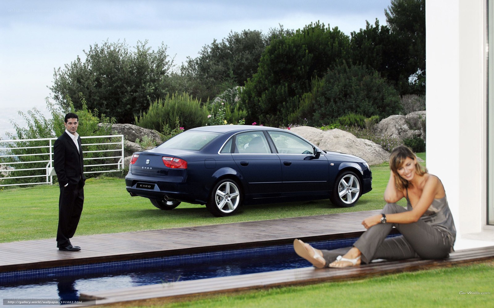 Man and woman with car by pool