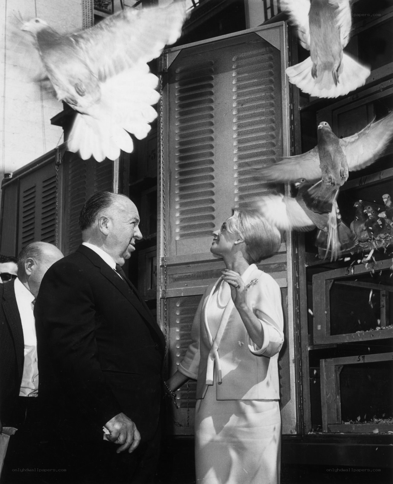 Man and woman with doves
