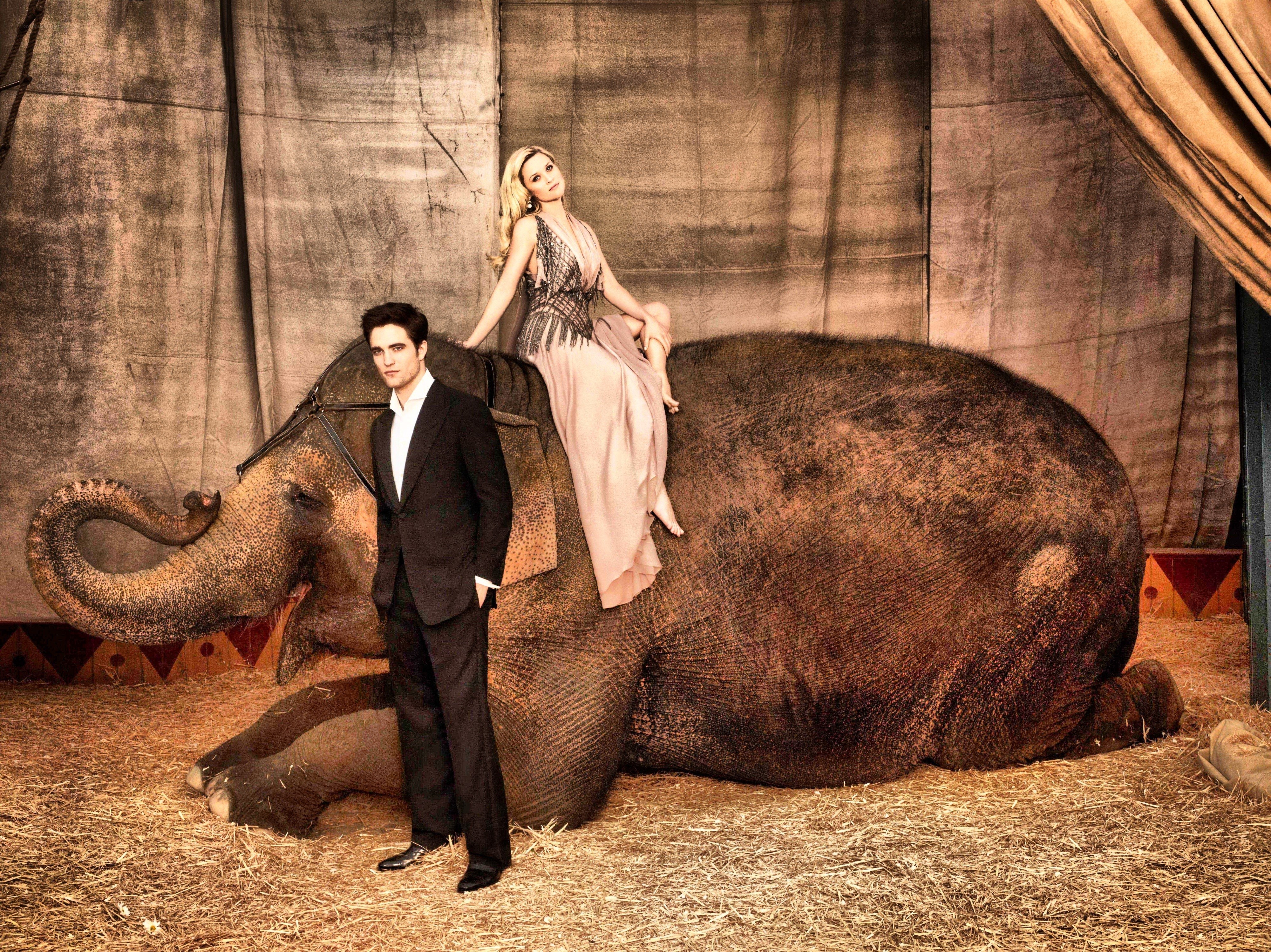 Man and woman with elephant