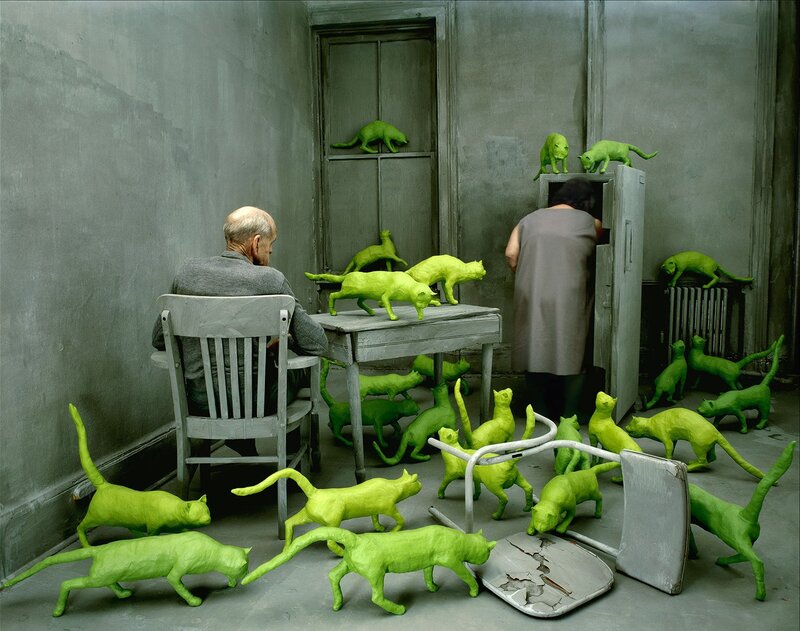 Man and Woman with Green Cats