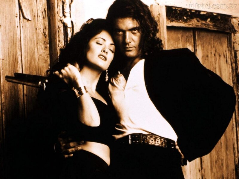 man and woman with gun