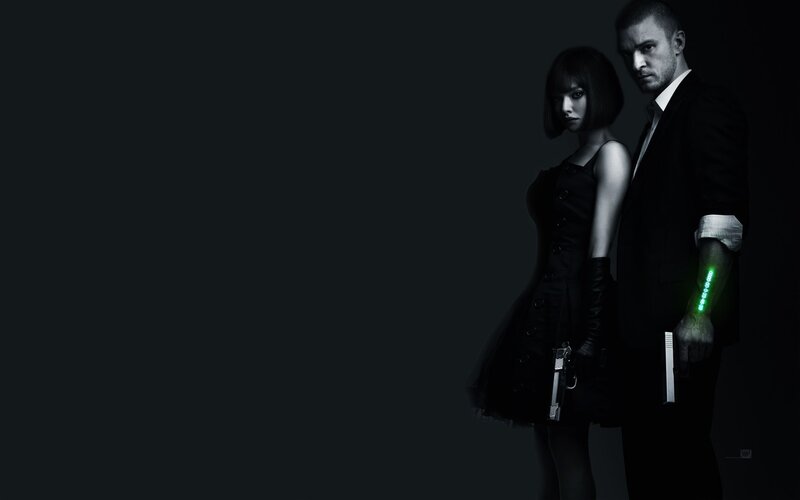 man and woman with guns