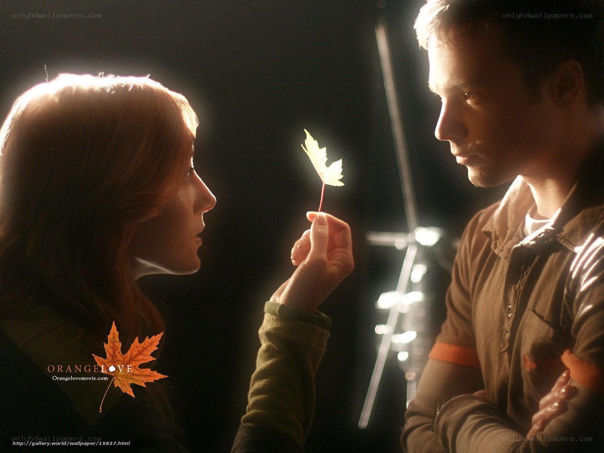 man and woman with leaf