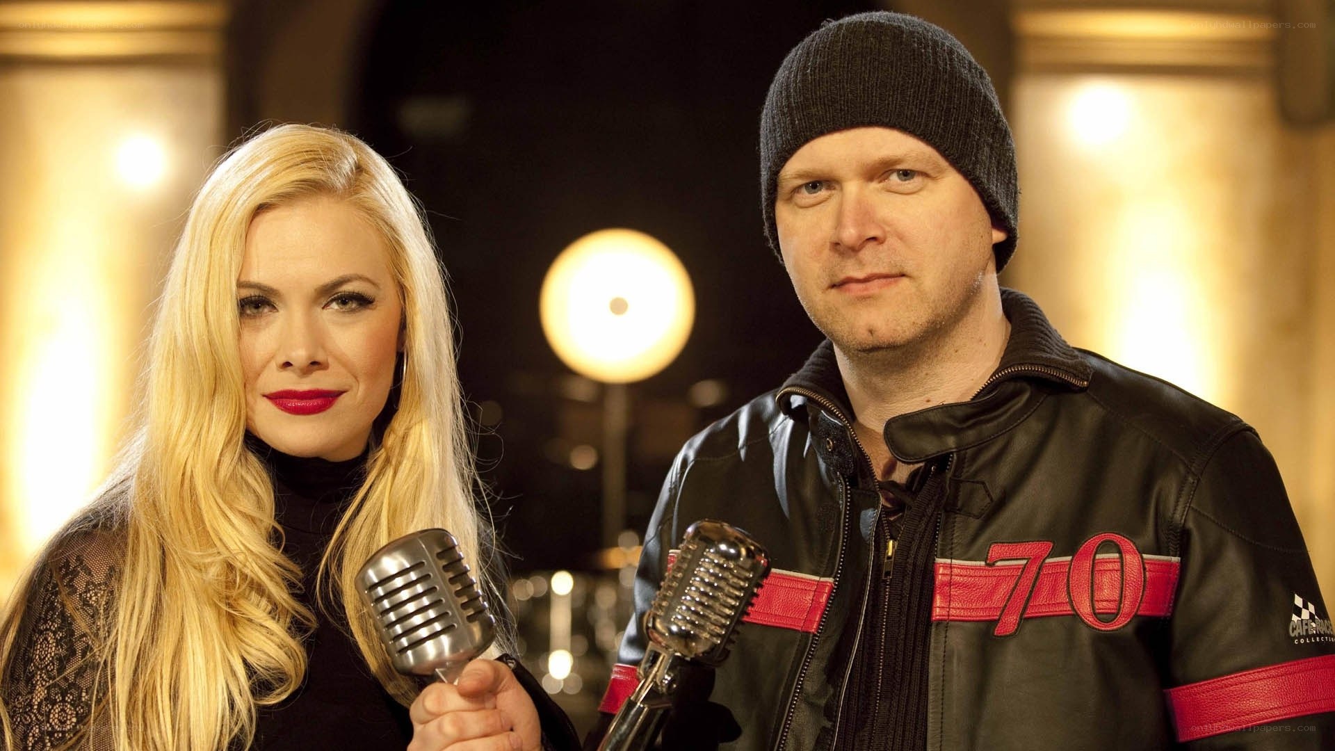 Man and woman with microphones