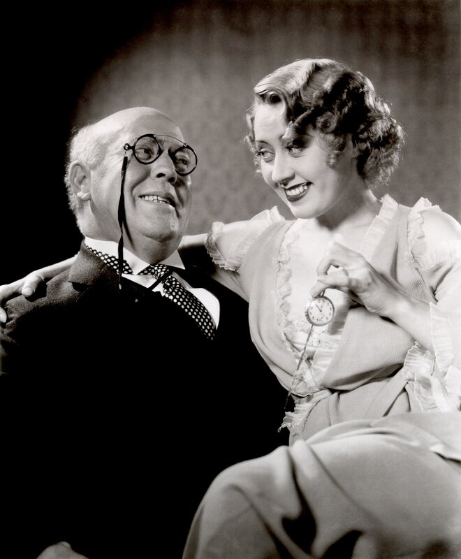 Man and woman with pocket watch