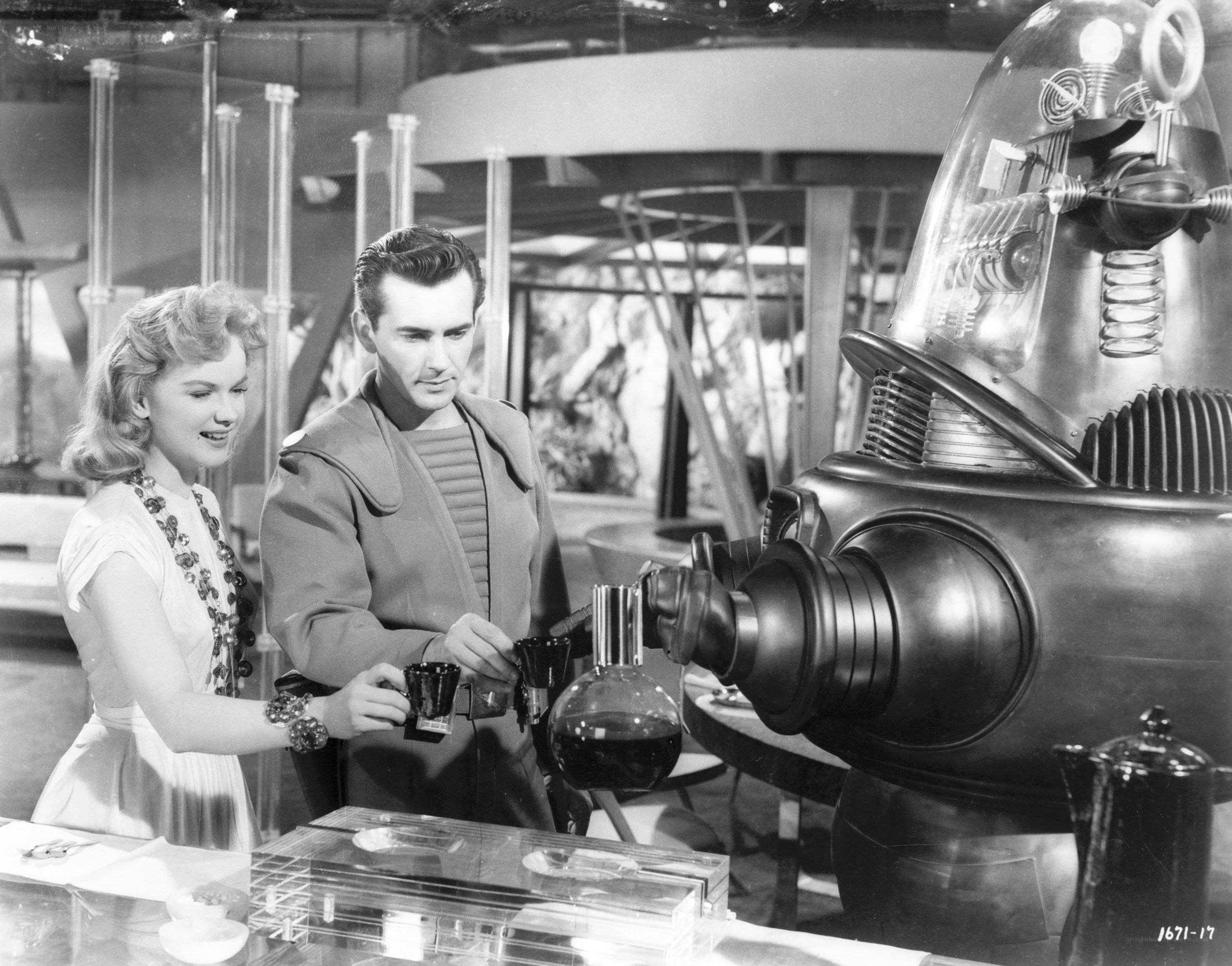 Man and woman with robot