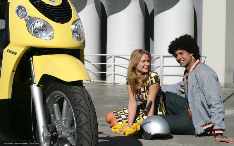 Man and Woman with Scooter — Yellow