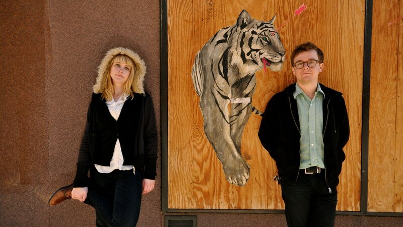 Man and woman with tiger painting