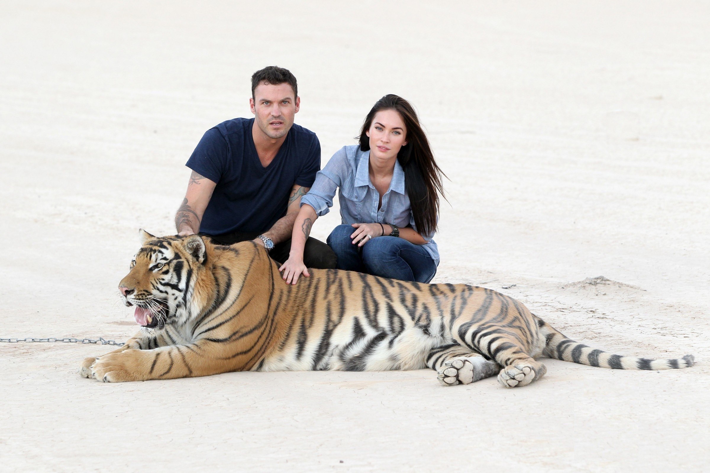 Man and woman with tiger