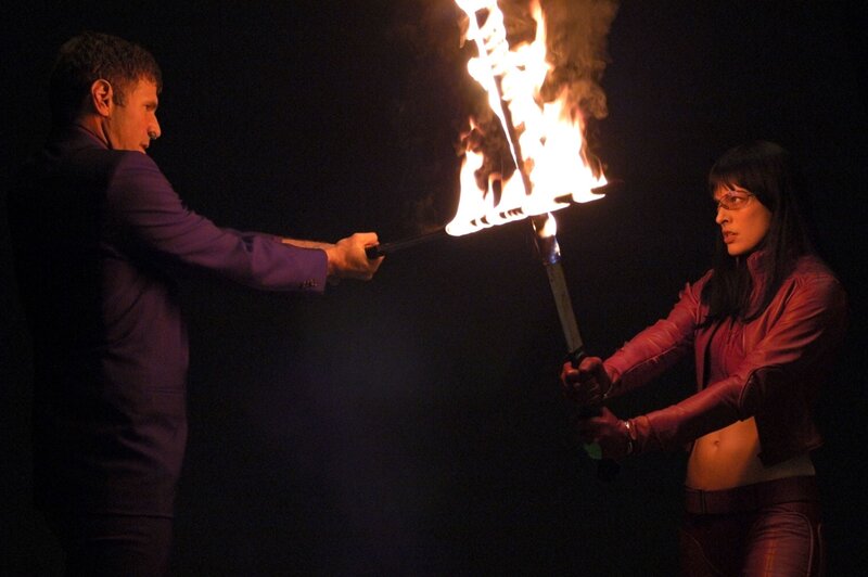 Man and woman with torches