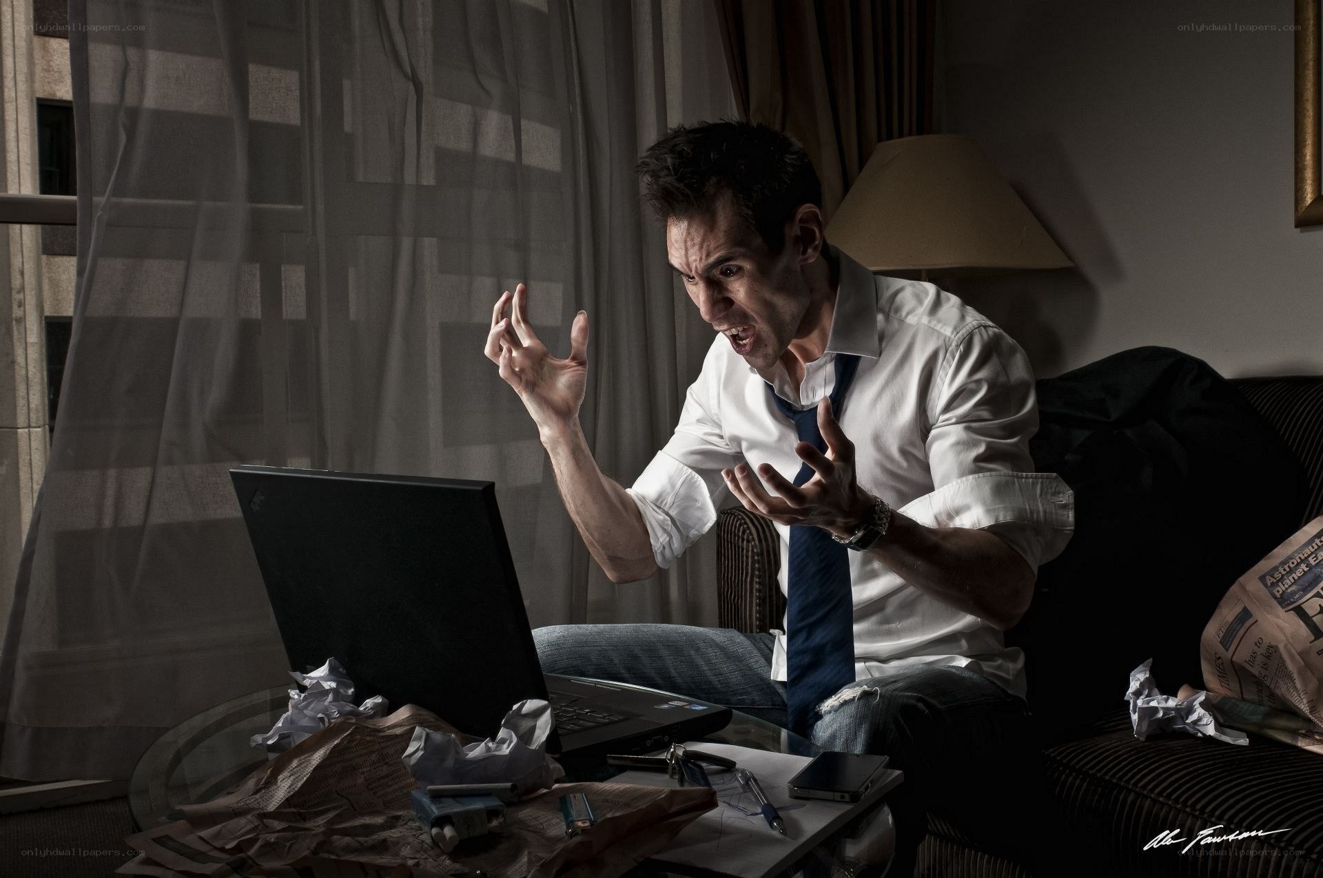 Man angry at laptop