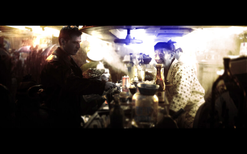 man at a bar with an older man