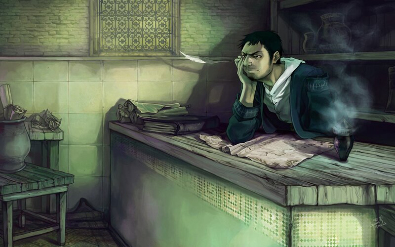 man at a desk in a dim room
