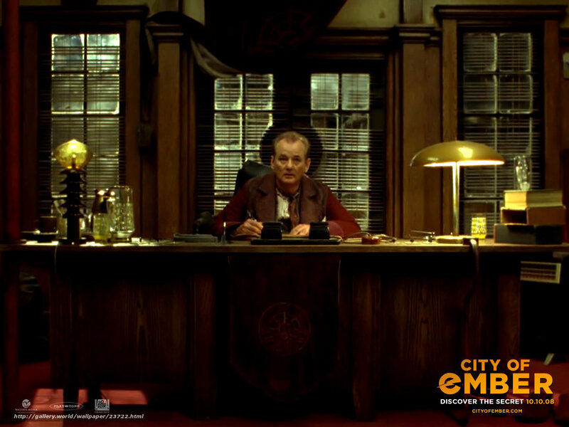 man at a desk in a study