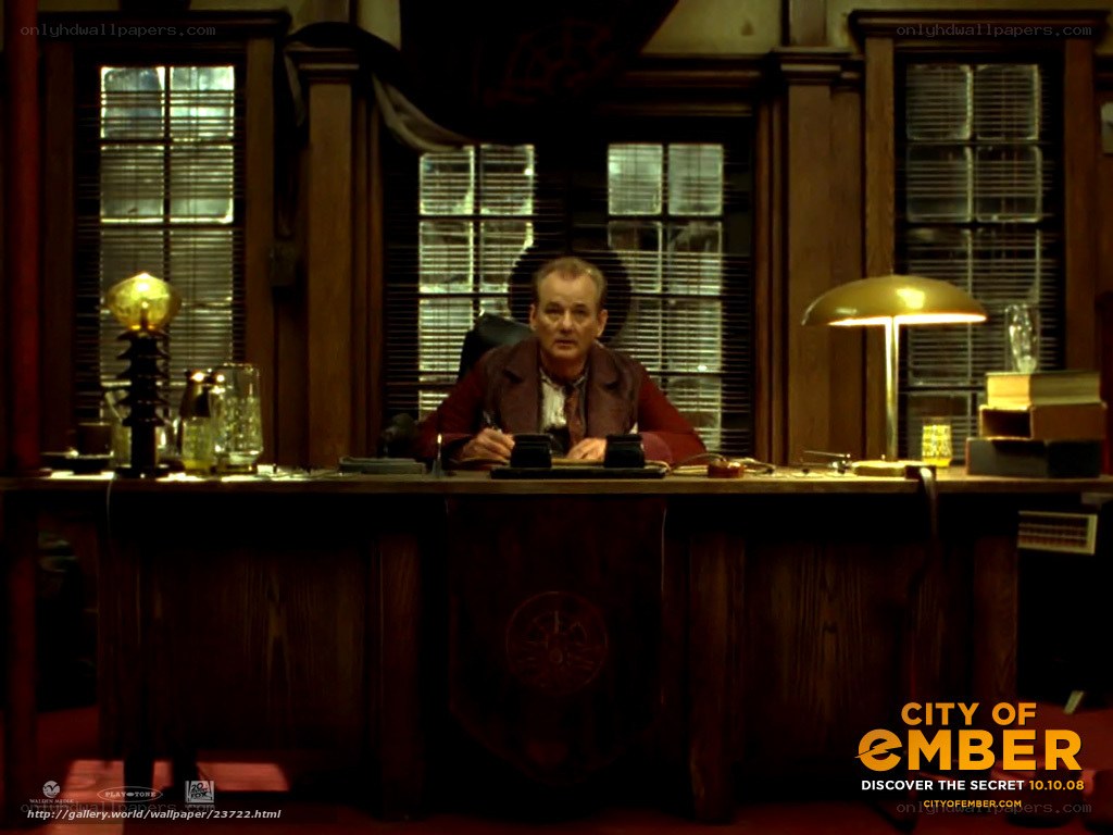 man at a desk in a study