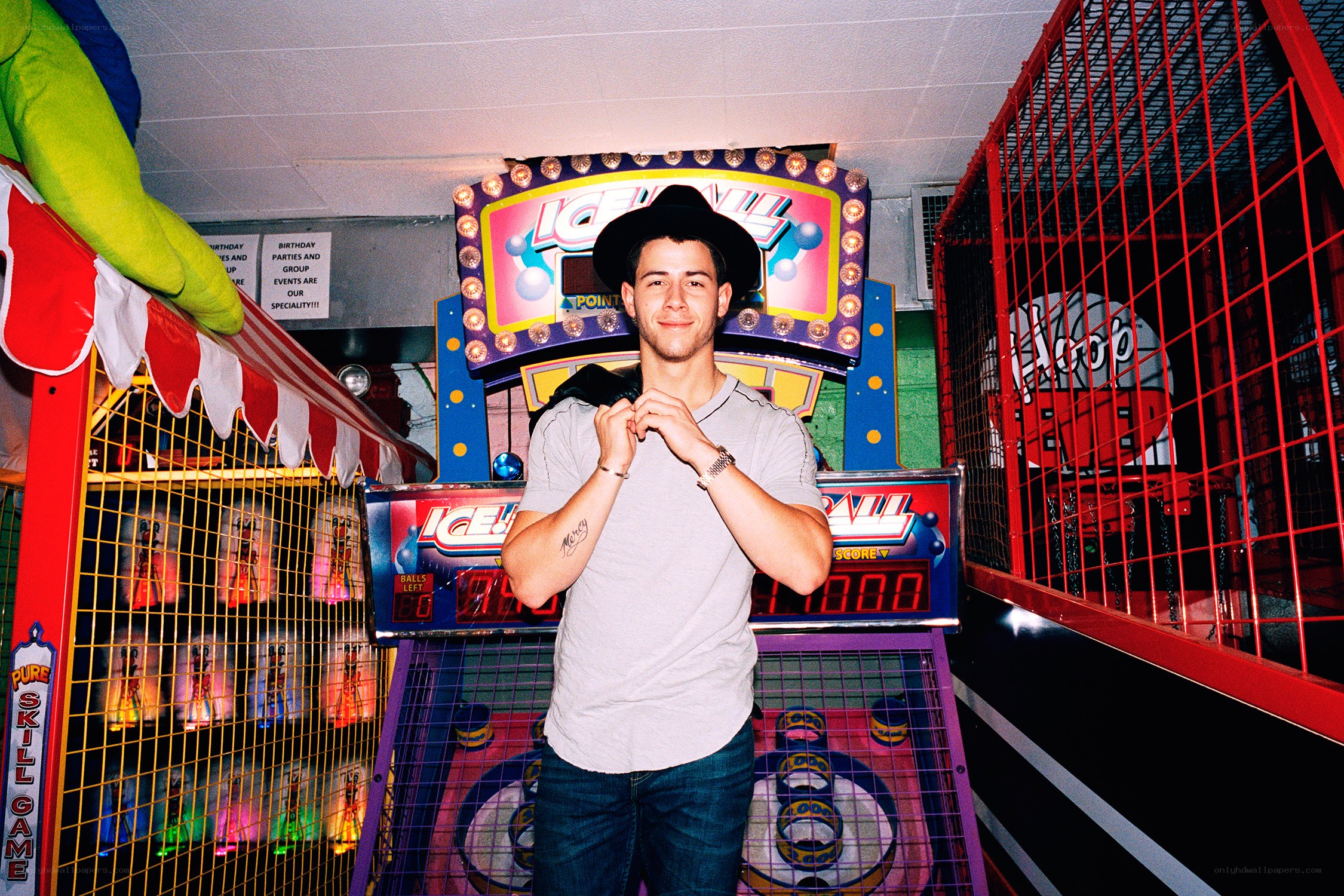 Man at arcade game