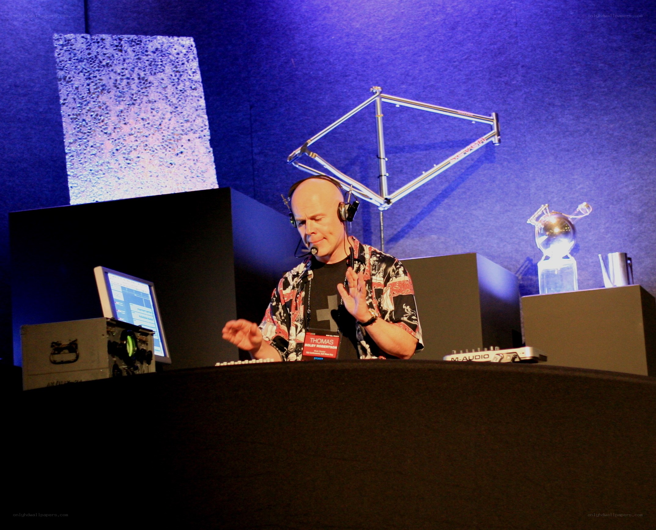 Man at audio mixing console