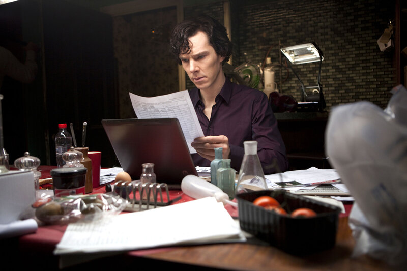 Man at Cluttered Desk — Brown