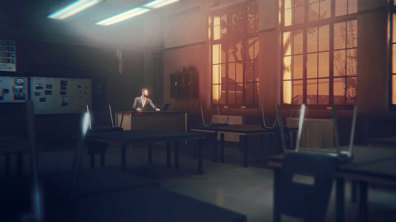 Man at Desk in Classroom