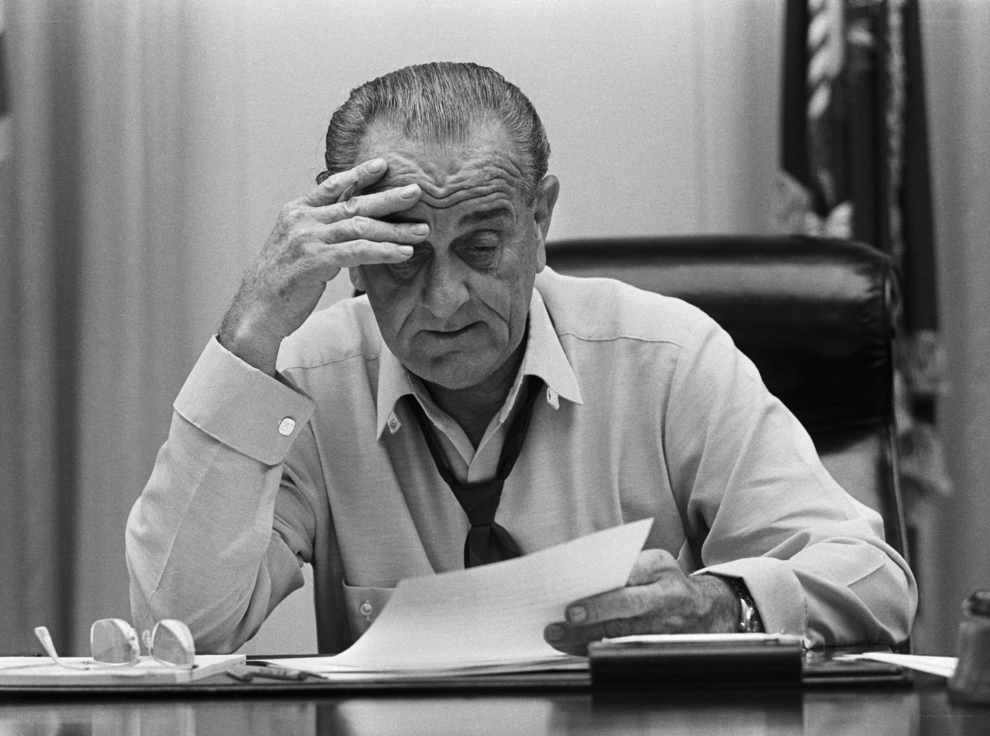 Man at desk with papers