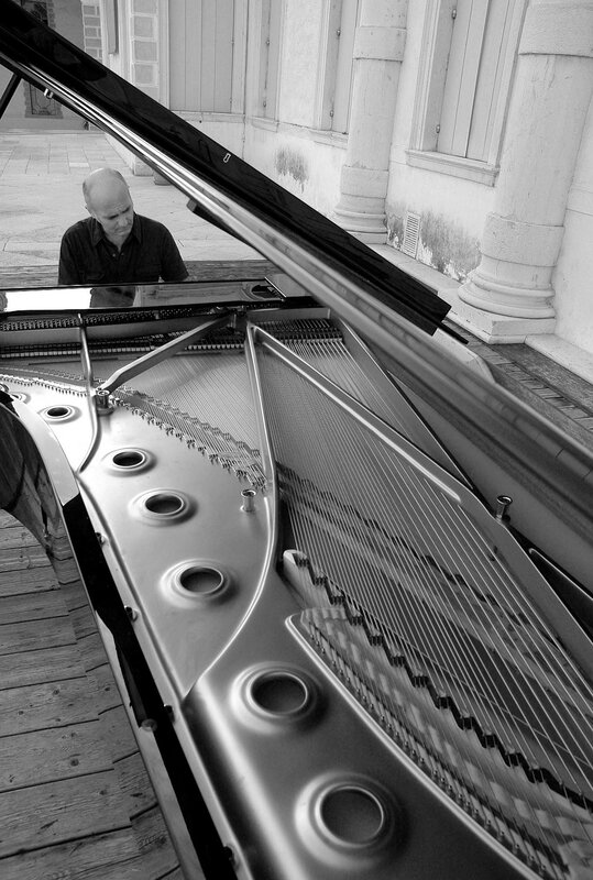 Man at Grand Piano — Black