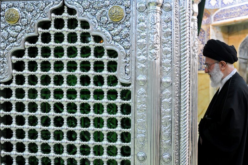 Man at ornate shrine