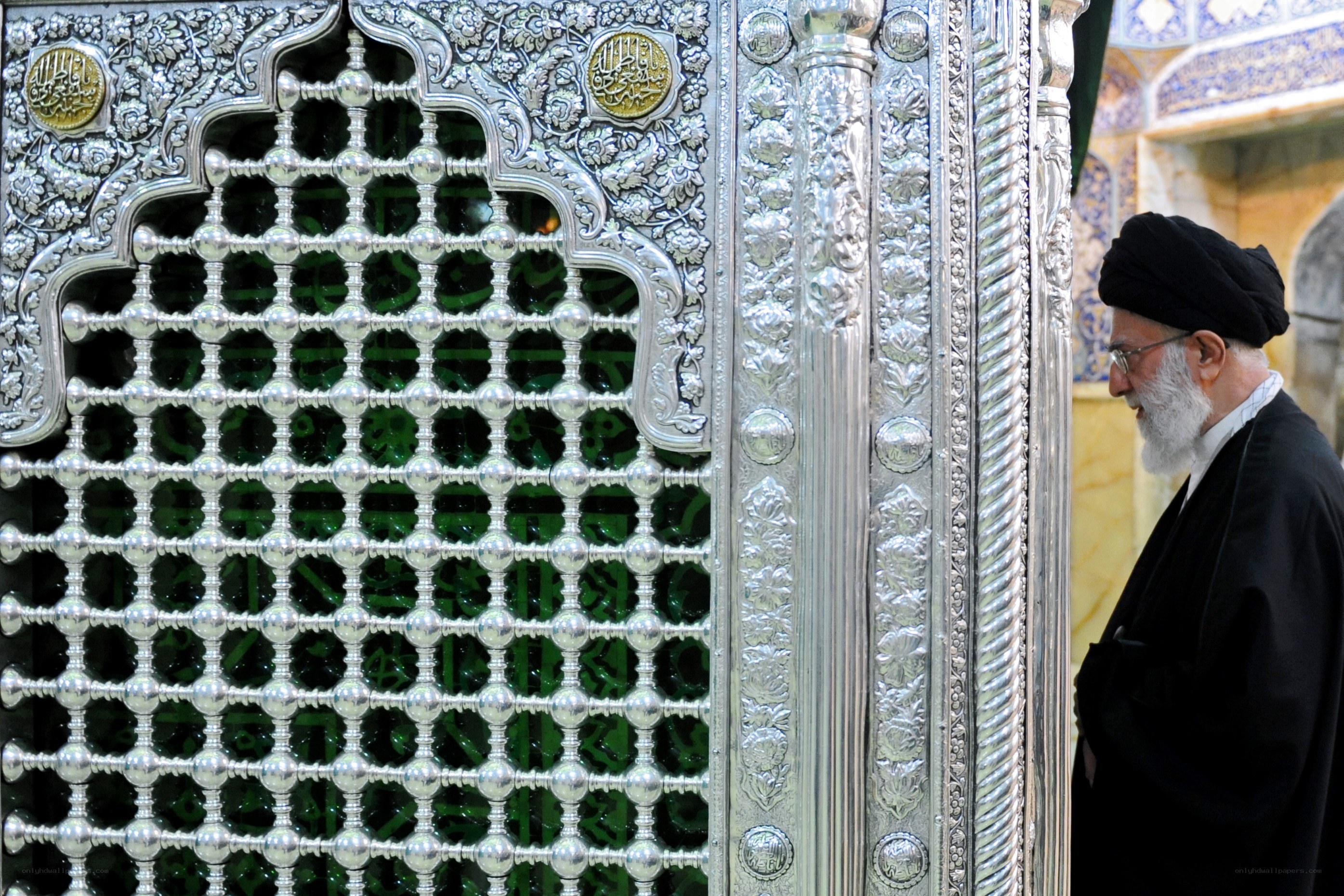 Man at ornate shrine