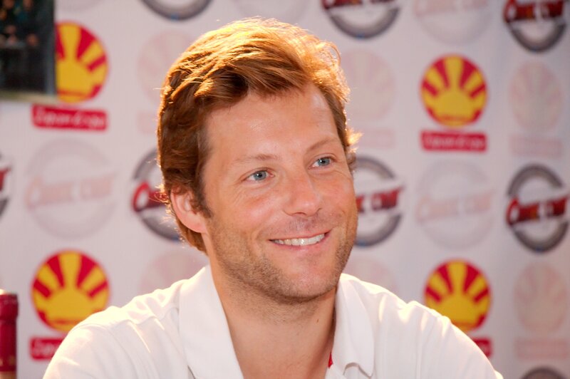 man at press event
