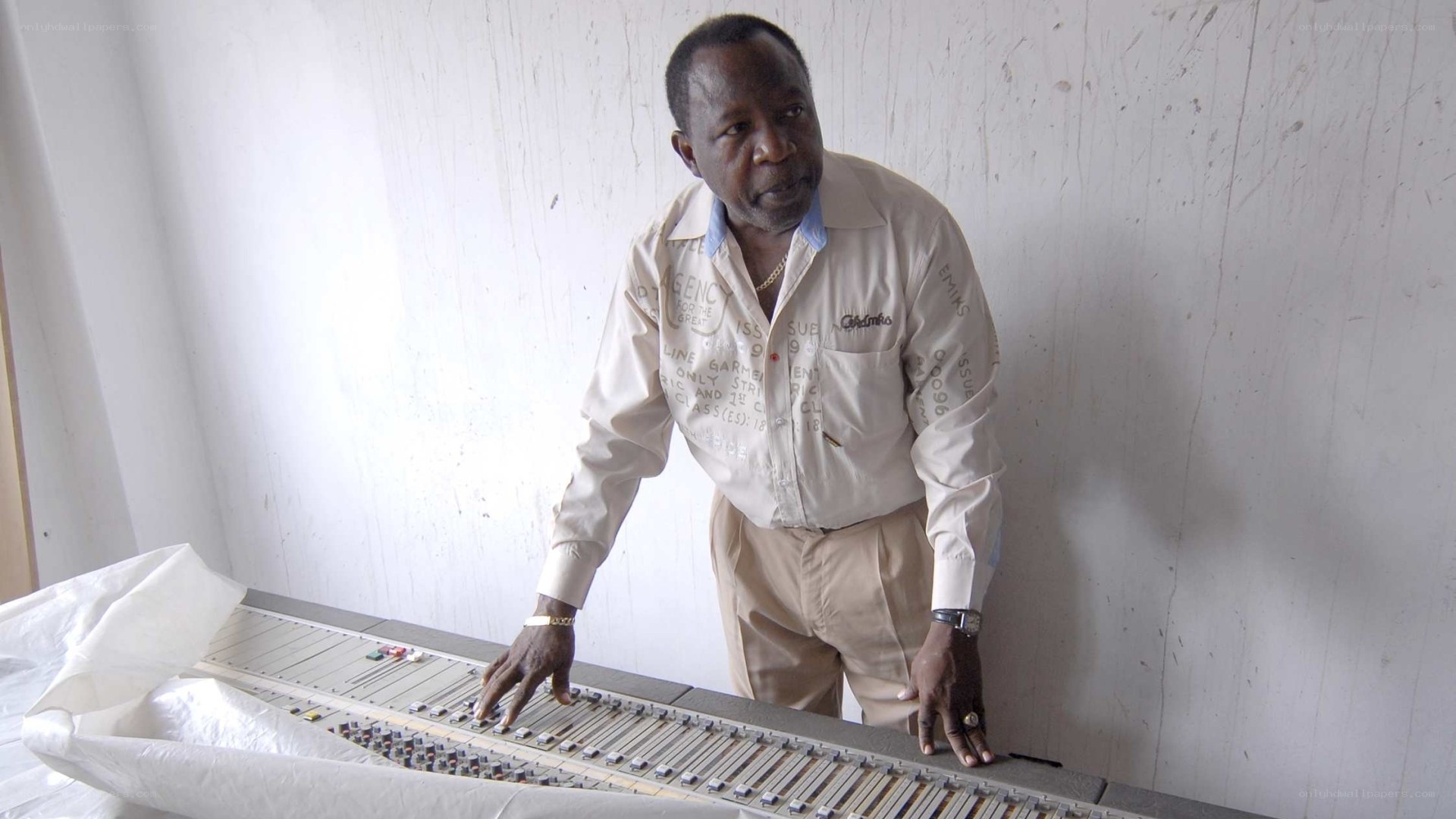 Man at sound mixing board