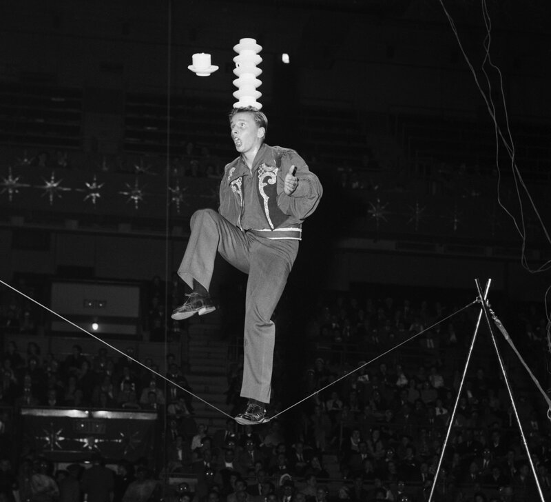 Man balancing on a tightrope