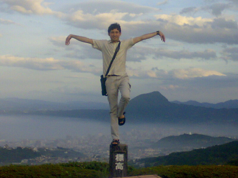 Man Balancing on Post