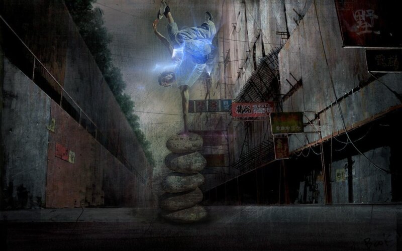man balancing on stones in alley