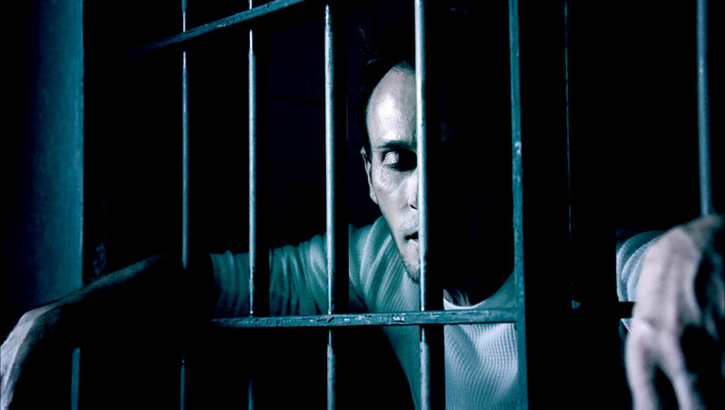 Man Behind Bars — Blue, Dramatic
