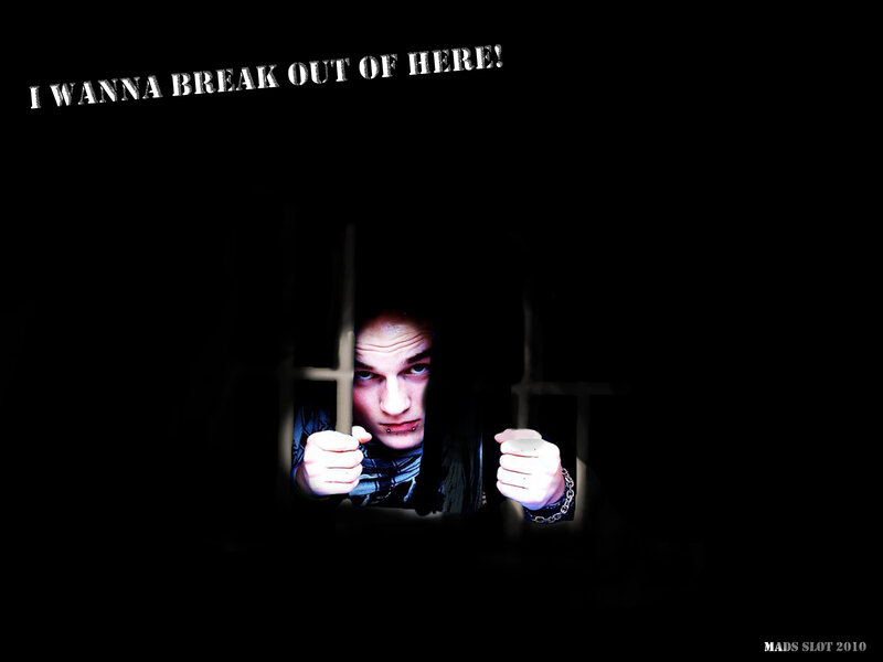 man behind bars wanting to escape