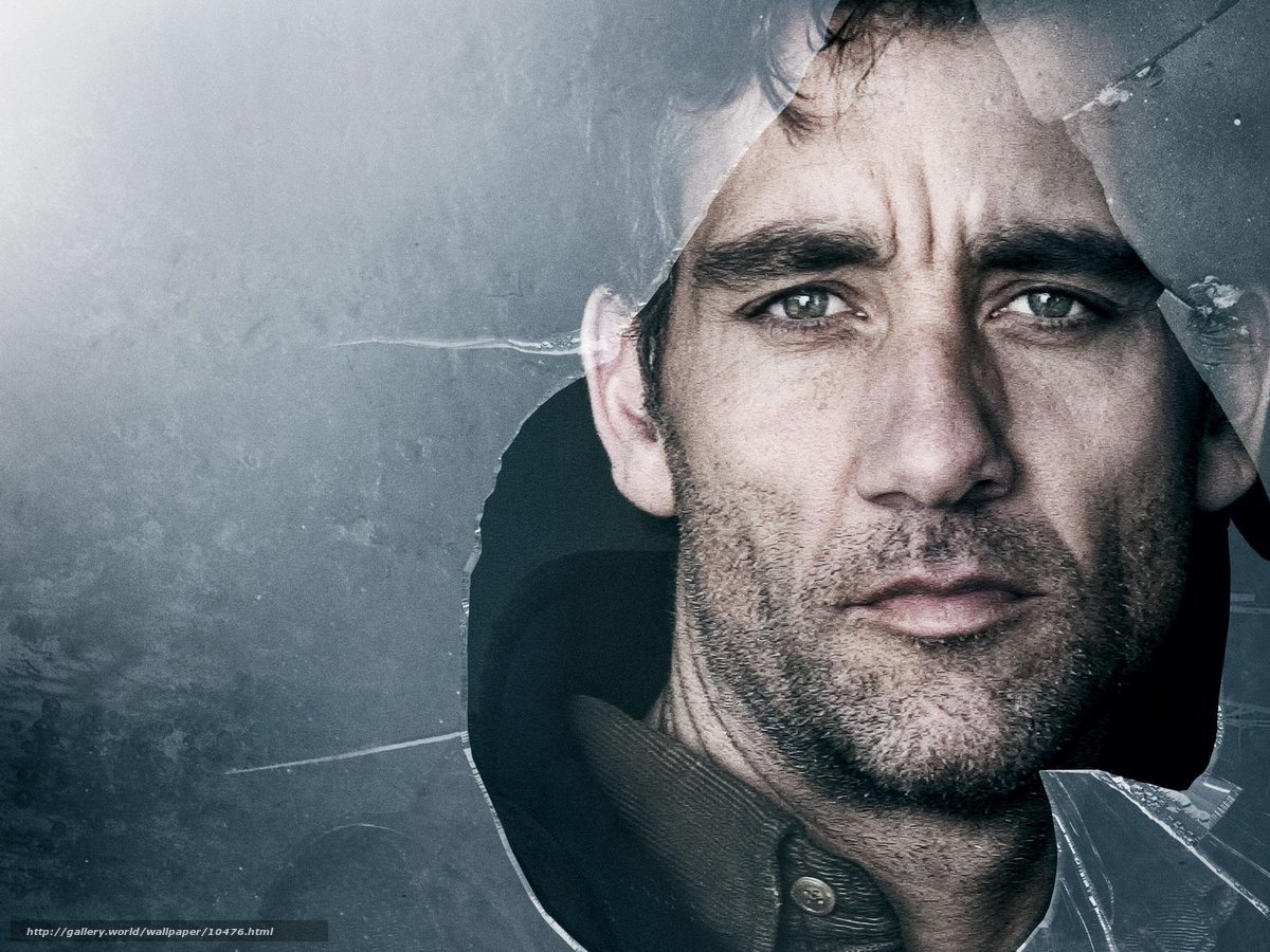 man behind cracked glass