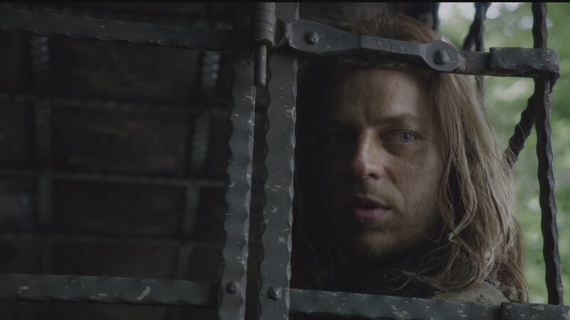 Man Behind Iron Bars